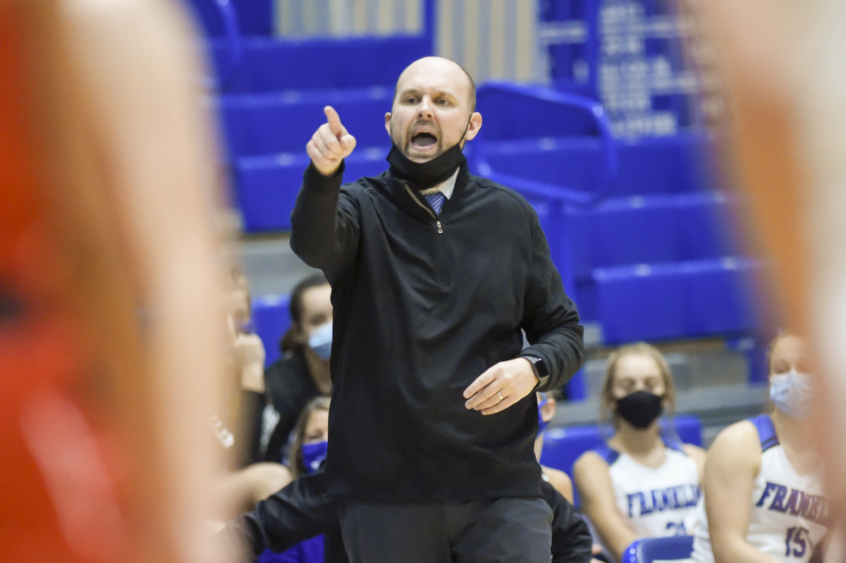 Franklin coach Josh Sabol yells directions to his team during Franklins 30-29 victory over Center Grove on Tuesday at Franklin Community High School.