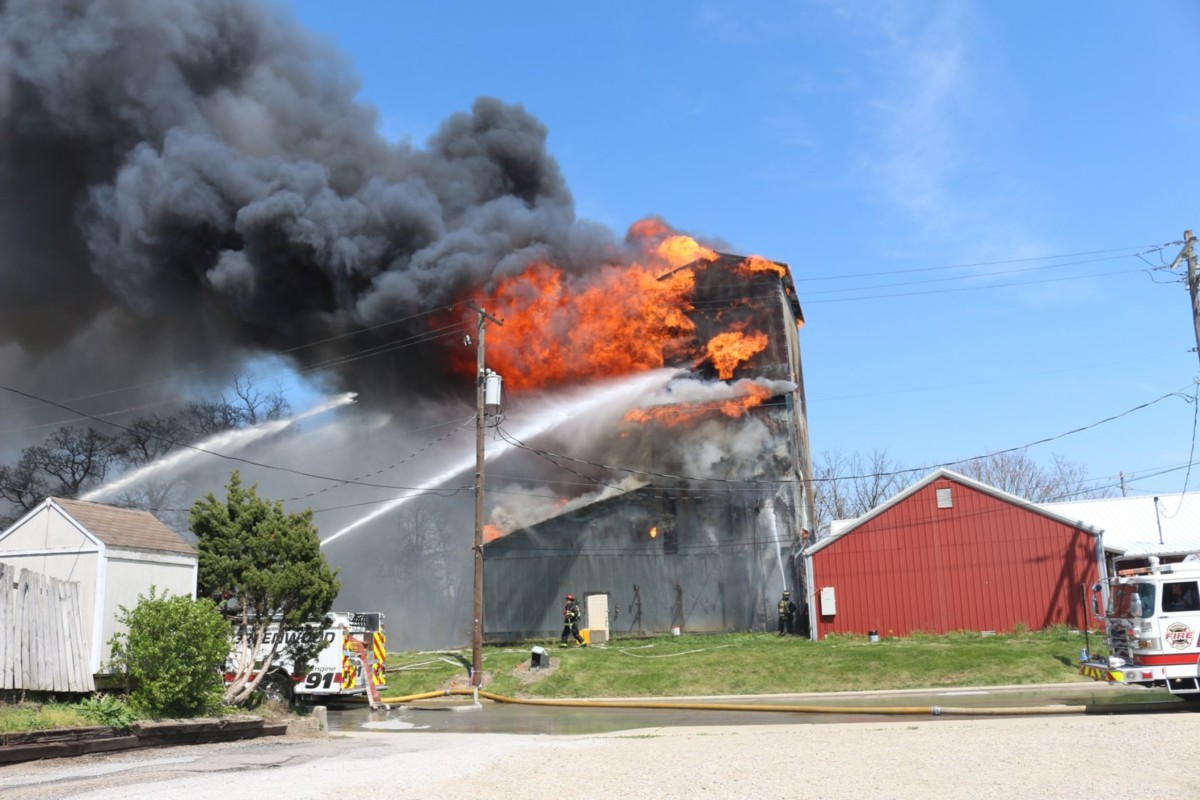 The abandoned Farm Bureau Co-op building in downtown Greenwood burned down late Tuesday afternoon. Photo courtesy of the Greenwood Fire Department. 