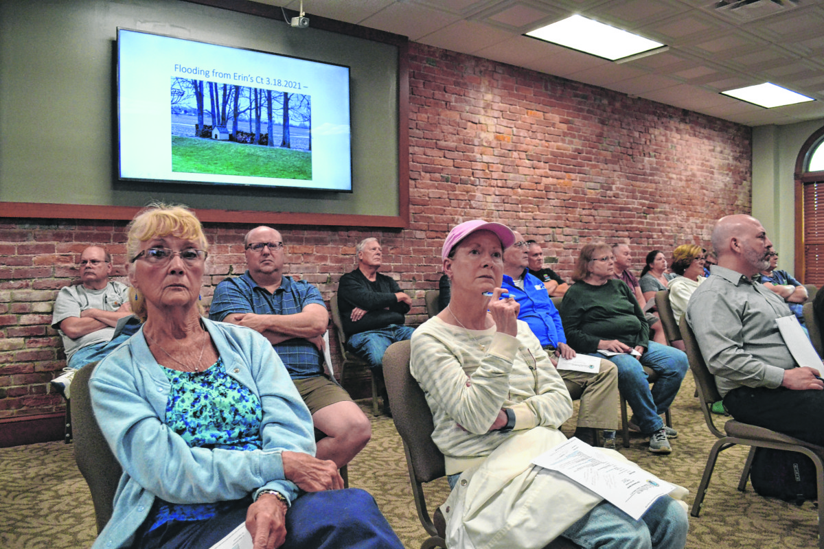 Concerned residents listen to Richard Hill's presentation at the Franklin Plan Commission meeting on Tuesday. 